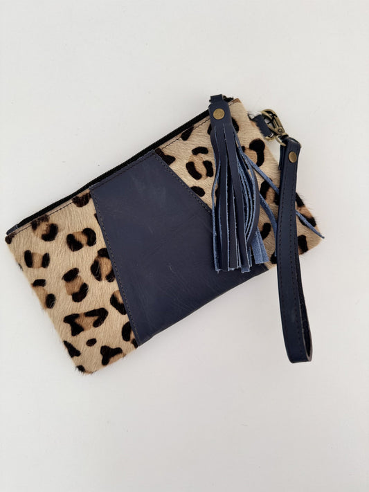 Leather handbag with animal print