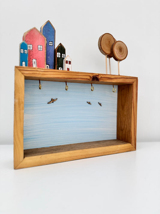 Handmade wooden key ring in light blue color