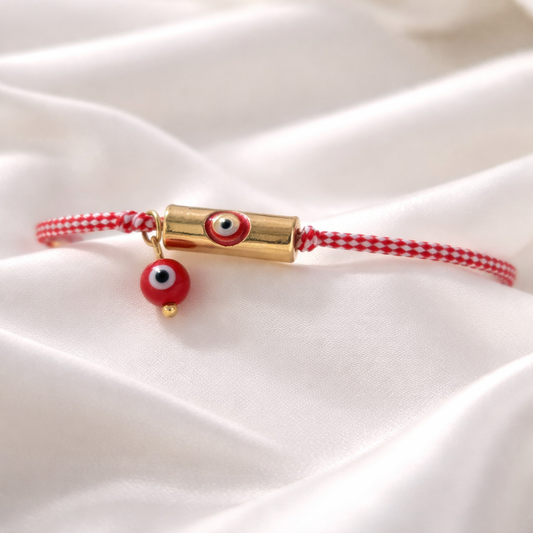 Μαρτάκι με μεταλλικό κύλινδρο χάντρα με κόκκινο ματάκι