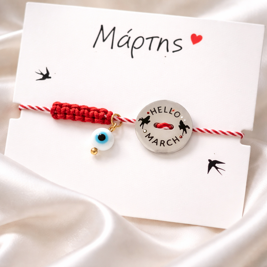 Μαρτάκι με μεταλλικό ασημί στοιχείο "HELLO MARCH" με ματάκι